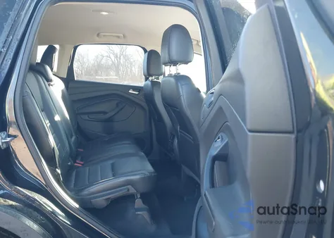 2015 Ford Escape Titanium z USA, uszkodzony, nr VIN 1FMCU0J90FUA20356